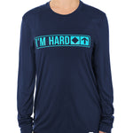 Front view of a female model wearing the "I'm Hard" Navy performance long sleeve Shirt. The graphic features trail sign-inspired "I'm Hard" text with a single diamond symbol indicating advanced terrain.