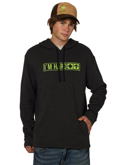Male model wearing Till I Die "I'm Hard" hoodie with Lime Logo Cork Trucker hat, front view, Winter 2025