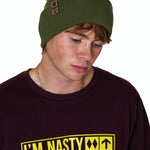 Male Model wearing a military green beanie and a oxblood shirt with 'I'M NASTY' text in bright yellow on a white background