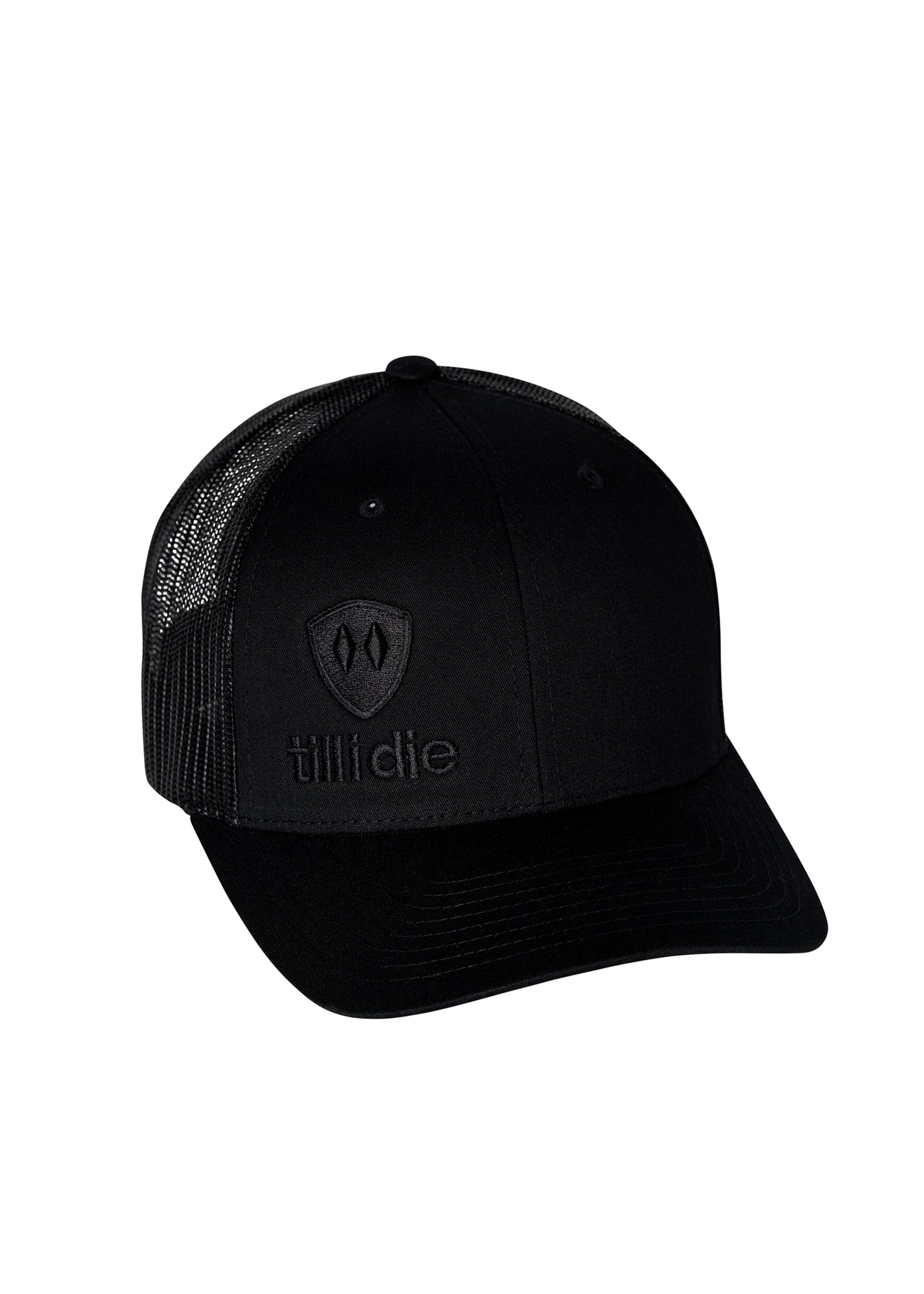 Flat lay of the Till I Die Black-on-Black Trucker Hat, showcasing the stacked logo and Double Diamond Shield in puff embroidery.