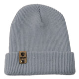 Flat lay of the Till I Die cadet bluel knit beanie showing  the medium gauge knit and branded leather logo tab on the cuff