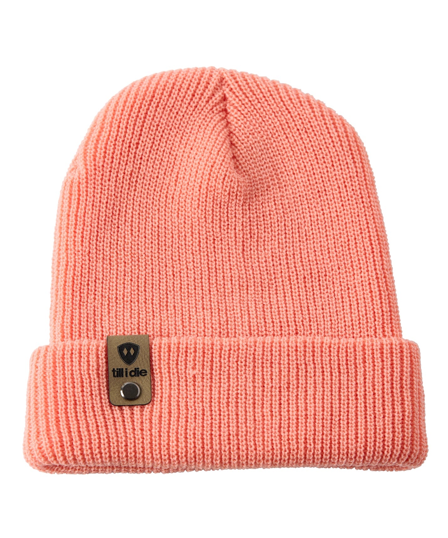 Flat lay of the Till I Die coral knit beanie showing  the medium gauge knit and branded leather logo tab on the cuff