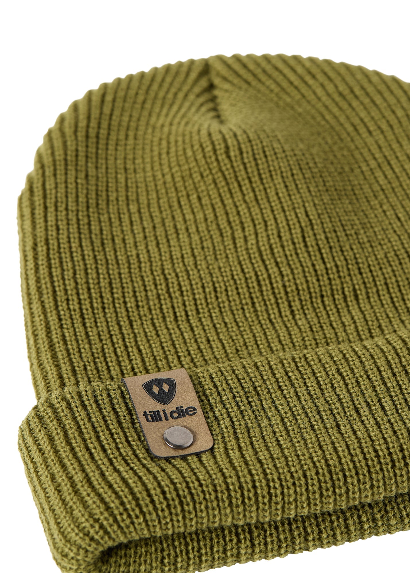 Flat lay of the Till I Die military green  knit beanie showing close-up detail of the medium gauge knit and branded leather logo tab on the cuff
