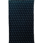 Overhead flat lay image of the back side of a black fleece neck gaiter featuring a repeating dark gray diamond-shield pattern. The gaiter has an adjustable drawstring at the top and is placed on a white background.