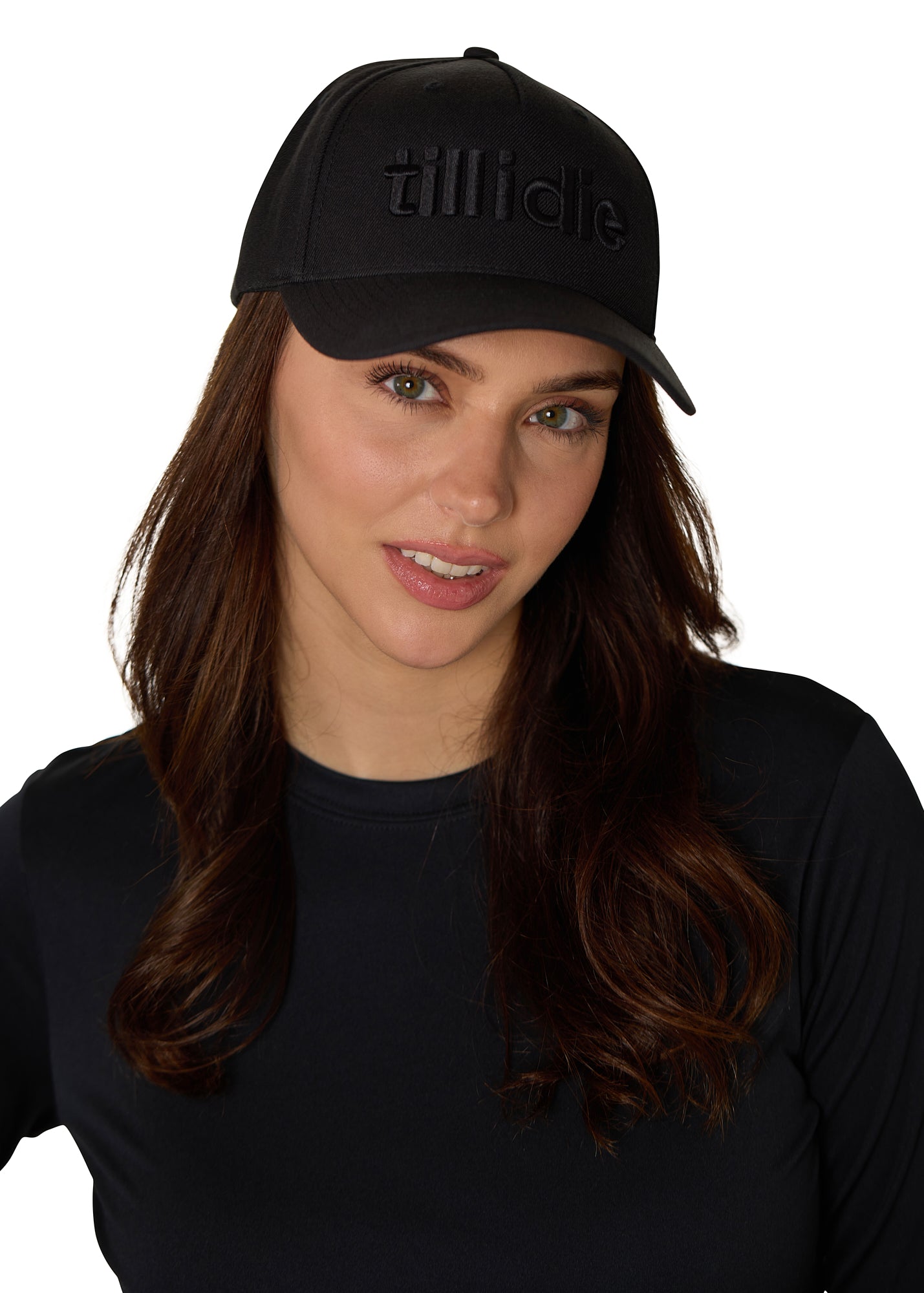 Female model styling the Till I Die black Puffer Hat with puff embroidered front logo and snapback closure