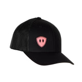 Flat lay of the Black Till I Die Double Diamond Shield Trucker Hat, showcasing the Double Diamond Shield in pink embroidery on the bottom right panel.