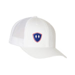 Flat lay of the White Till I Die Double Diamond Shield Trucker Hat, showcasing the Double Diamond Shield in red and blue embroidery on the bottom right panel.