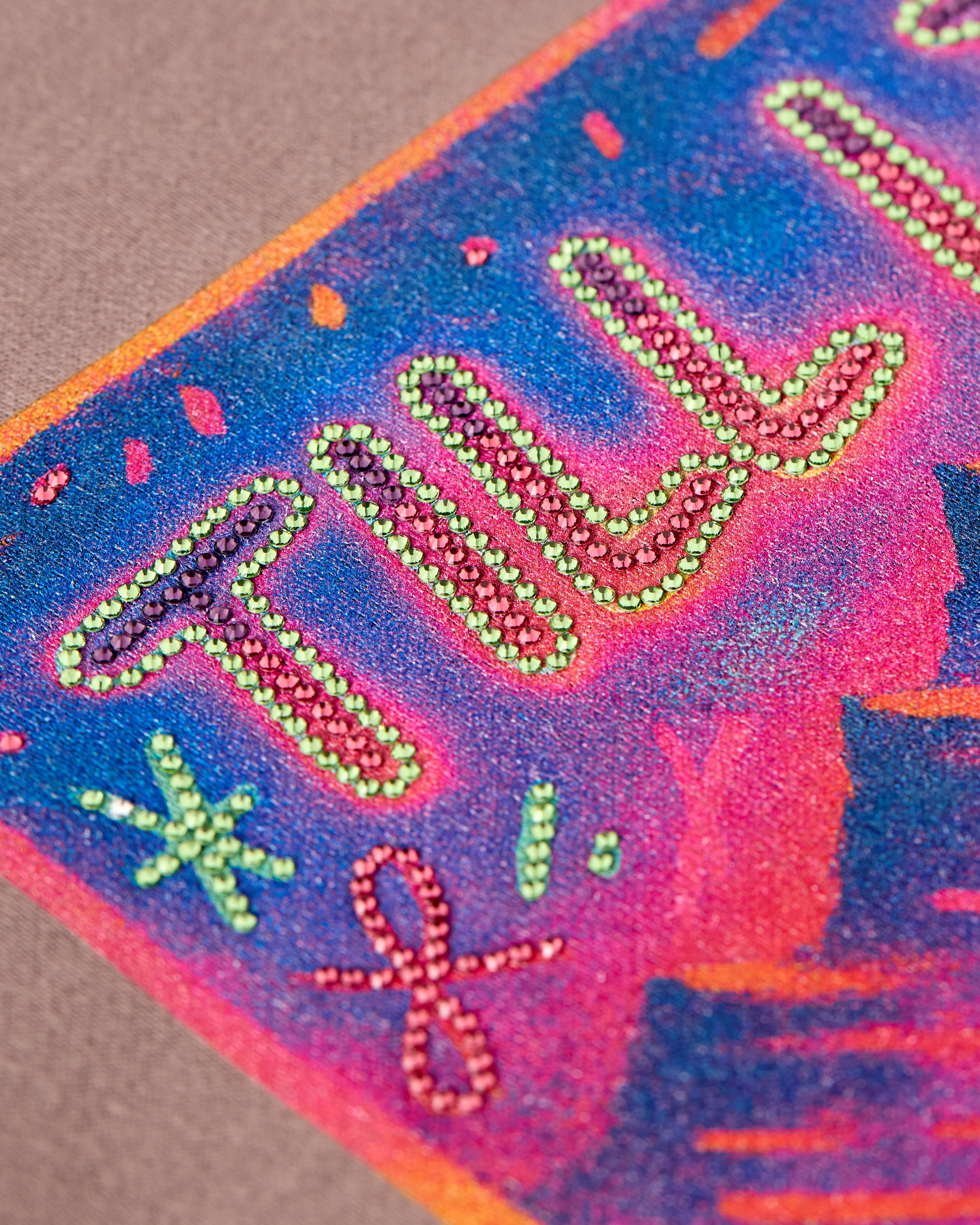 Back graphic of Ski Till I Die hoodie in Shiitake with rhinestones and mountain scene, Winter 2025