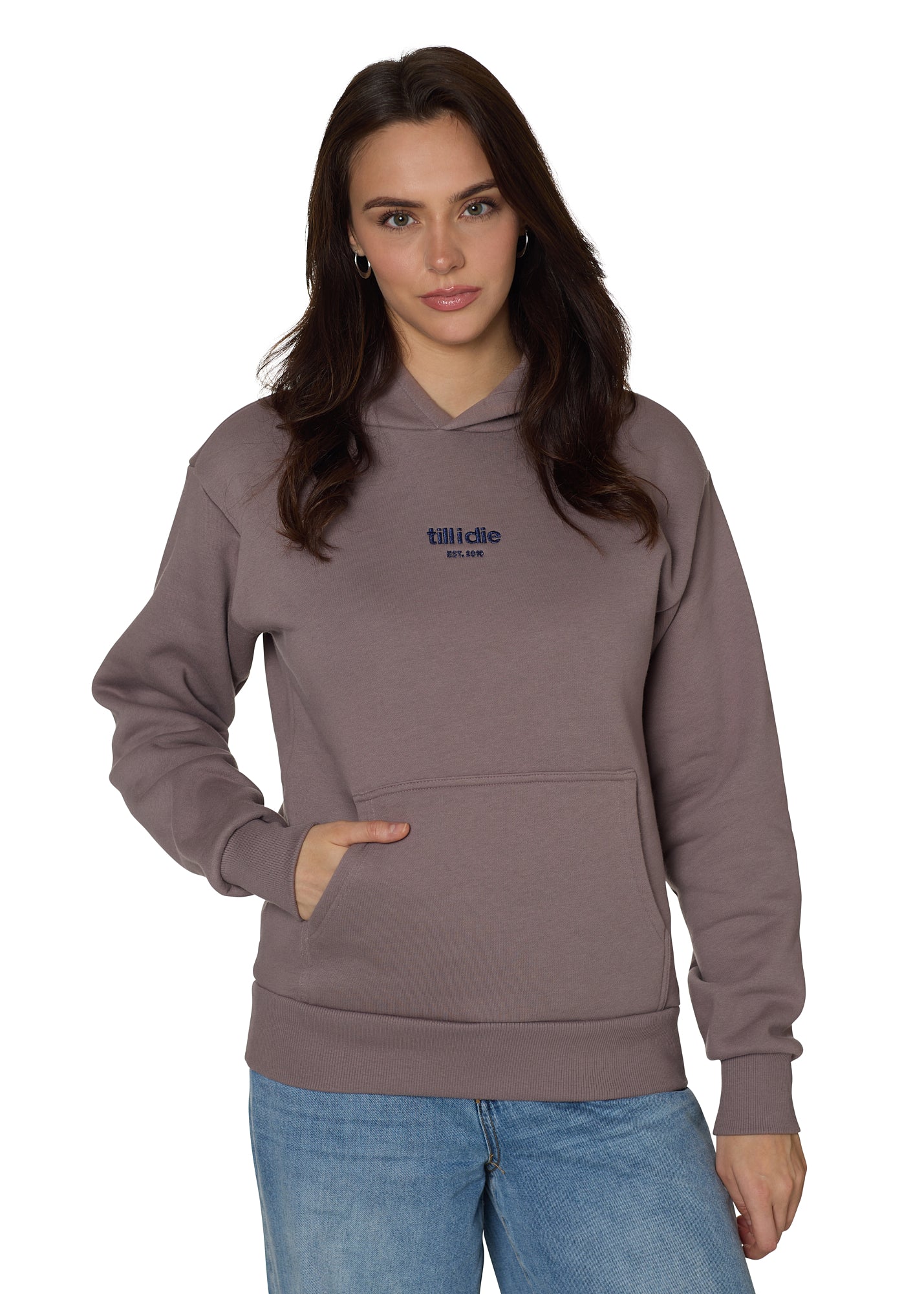 Female model in Ski Till I Die Rhinestone hoodie in Shiitake brown, front view with Till I Die and Established date 2010 in Sapphire metallic embroidery, Winter 2025 collection