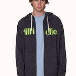 male model wearing a charcoal zip hoodie with lime green till i die written on the front, paired with a black ski till i die snapback cap and stone wash denim tee shirt