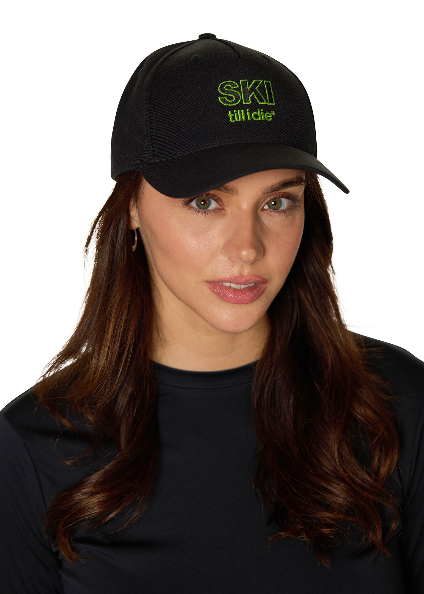Female model wearing black Ski Till I Die snapback hat with neon green embroidery and curved brim