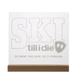 Ski Till I Die acrylic LED sign with etched text and double diamond logo, set in a wood base with USB power