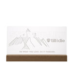 Clear acrylic LED sign with ÒSnowboard Till I DieÓ mountain graphic and etched lettering, mounted on a wood base, with multicolor light-up feature.