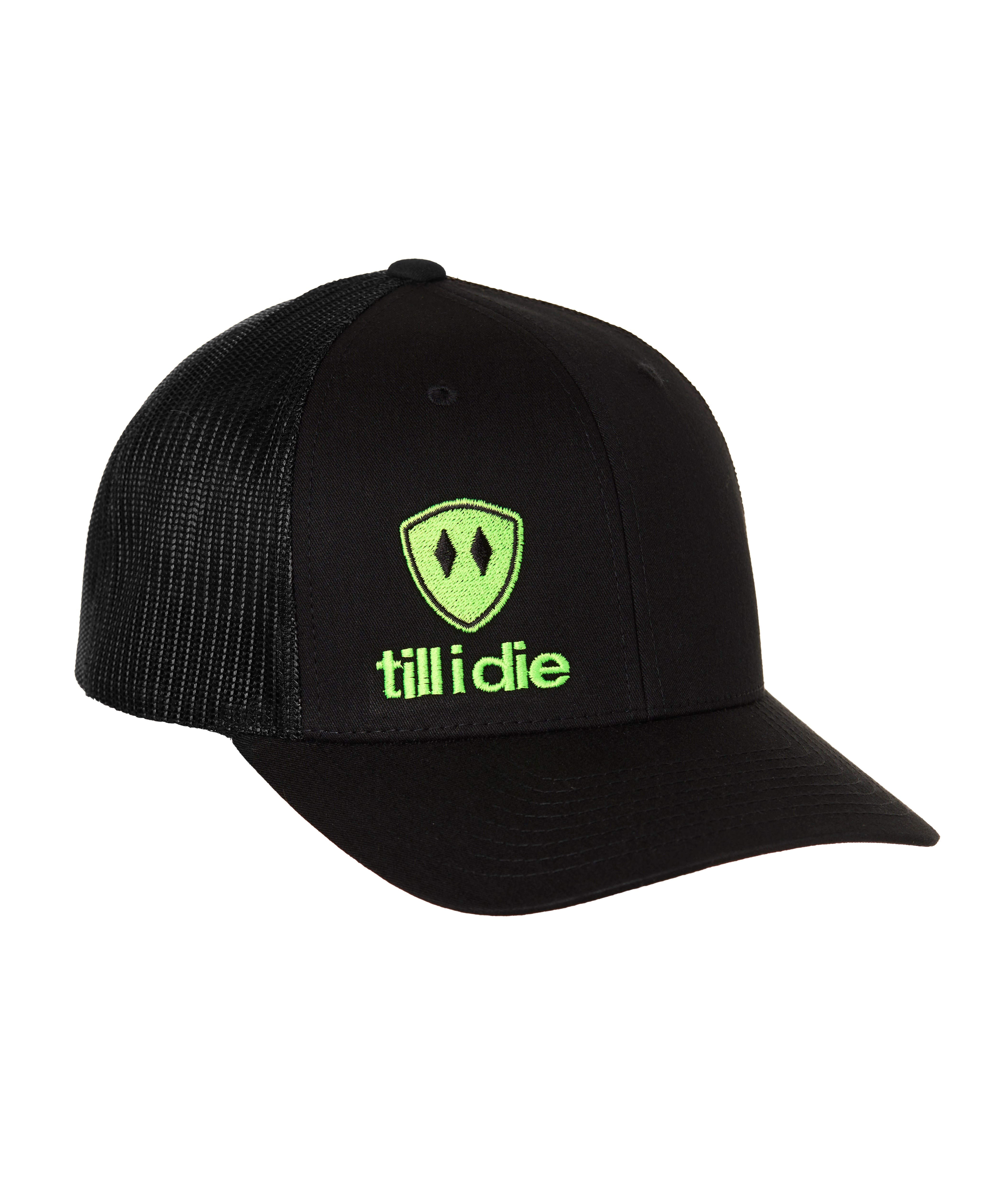 Front view of a black classic trucker hat, featuring a green embroidered Till I Die logo with double black diamonds and a green shield on the lower right front panel on a white background.