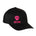 Front view of a black classic trucker hat, featuring a hot pink embroidered Till I Die logo with double black diamonds and a hot pink shield on the lower right front panel on a white background.