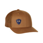 caramel trucker hat with a navy double diamond shield logo on a white background