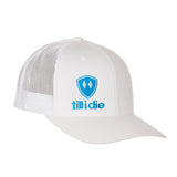 Front view of a white classic trucker hat, featuring a blue embroidered Till I Die logo with double white diamonds and a blue shield on the lower right front panel on a white background.