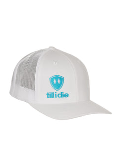 Front view of a white classic trucker hat, featuring a teal embroidered Till I Die logo with double white diamonds and a teal shield on the lower right front panel on a white background.