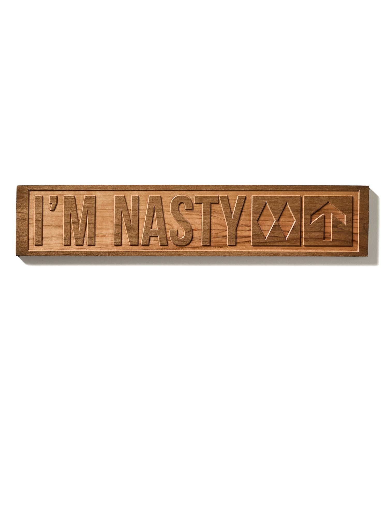 The “I’m Nasty” ski trail sign shown on a white background, featuring natural cherry wood with visible grain. The design includes double black diamonds and an upward-pointing arrow.